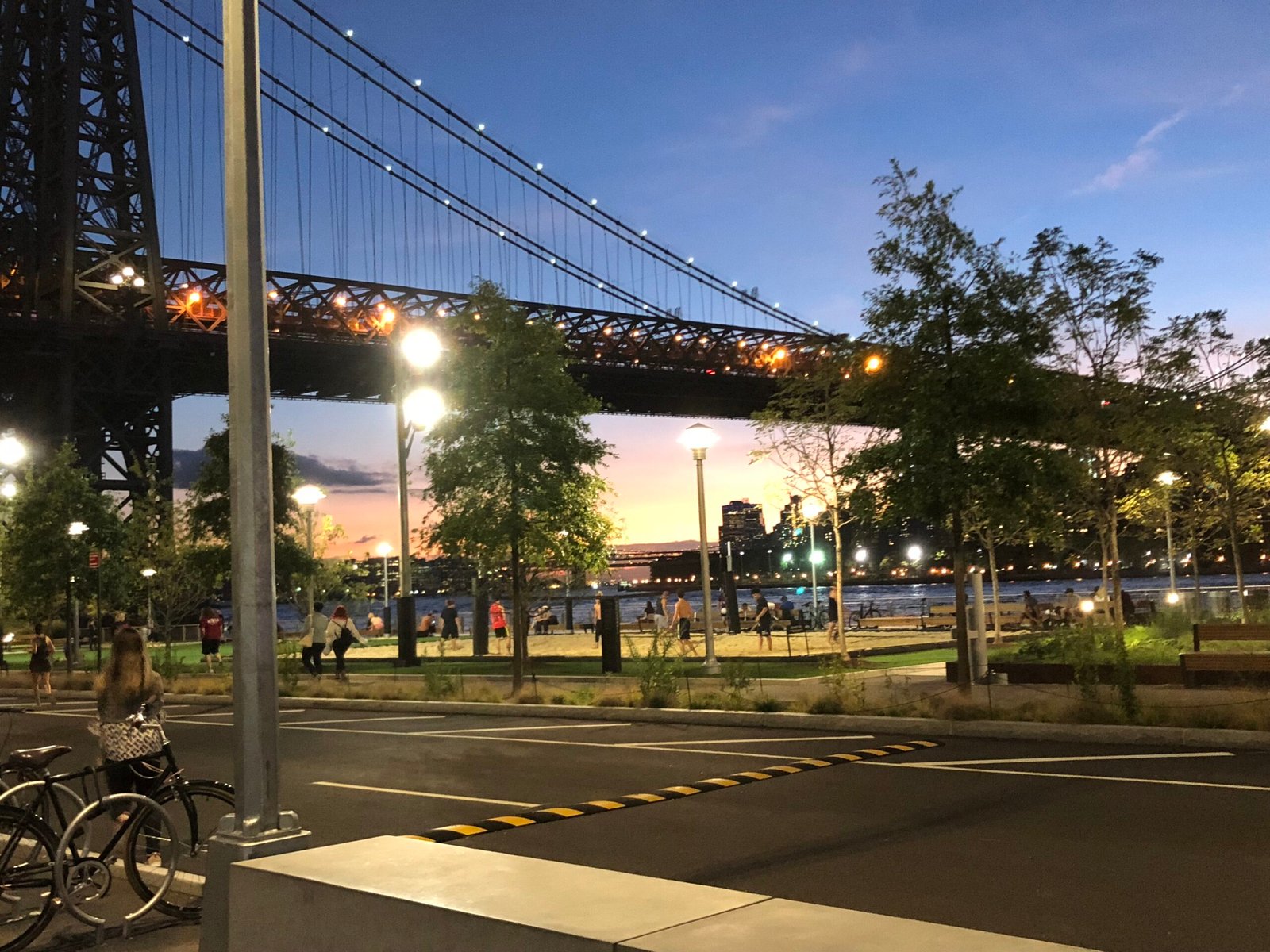 Domino Park in Williamsburg, Brooklyn with the Williamsburg Bridge and Manhattan skyline