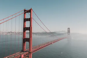 Aerial view of the Golden Gate Bridge with morning fog in San Francisco